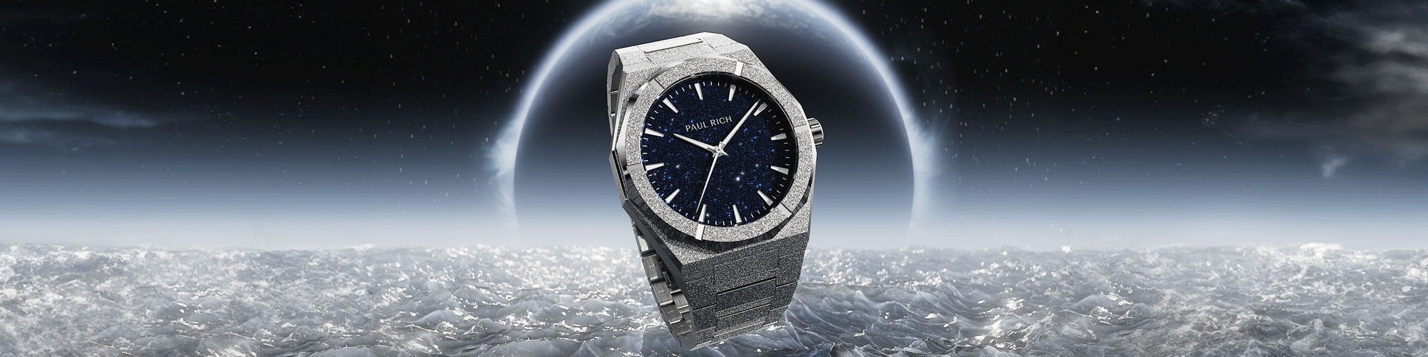 Paul Rich frosted silver watch with blue aventurine dial floating above icy terrain, set against a cosmic backdrop with glowing planet. Paul Rich frosted silver watch with blue aventurine dial floating above icy terrain, set against a cosmic backdrop with glowing planet.