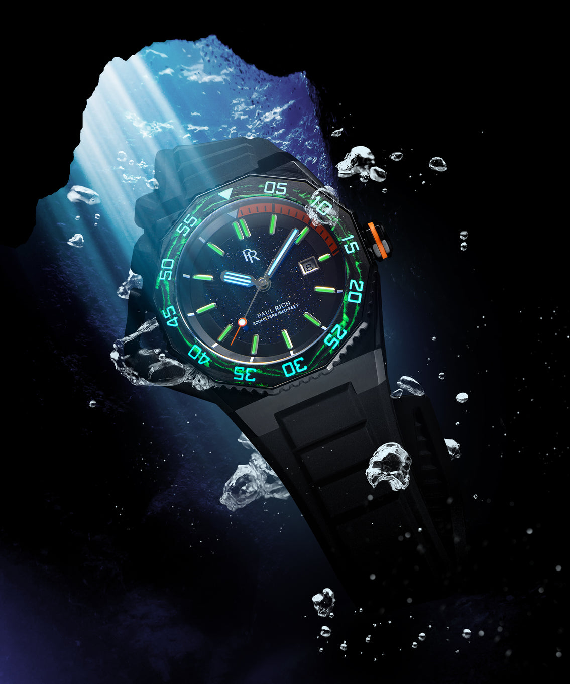 Paul Rich dive watch underwater, glowing green and blue lume on hands and bezel, orange crown ring, illuminated by sun rays. Paul Rich dive watch underwater, glowing green and blue lume on hands and bezel, orange crown ring, illuminated by sun rays.