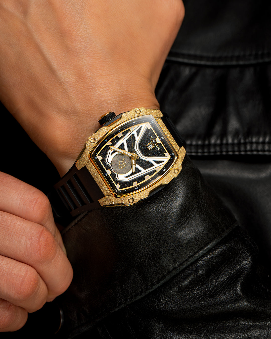 Paul Rich Astro Meteora with frosted gold bezel, meteorite inlay, and black rubber strap, worn with a black leather jacket. Paul Rich Astro Meteora with frosted gold bezel, meteorite inlay, and black rubber strap, worn with a black leather jacket.