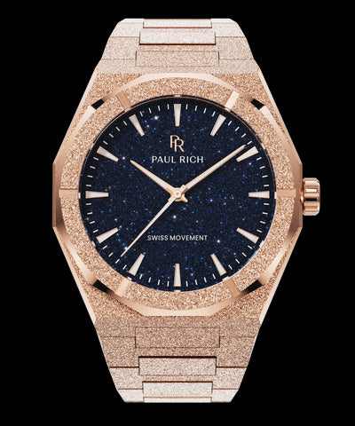 Frosted Star Dust II Rose Gold Rose gold frosted Paul Rich watch with deep blue aventurine dial, rose gold markers and hands, shown on transparent background.