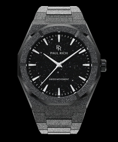 Frosted Star Dust II Void Black Paul Rich watch with frosted black case and bracelet, featuring a black aventurine dial and silver hands and hour markers.