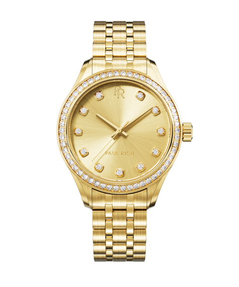 Crystelle - All Gold Front view of a gold-tone Paul Rich watch with a matching sunray dial, diamond hour markers, gem-set bezel, and gold jubilee bracelet.