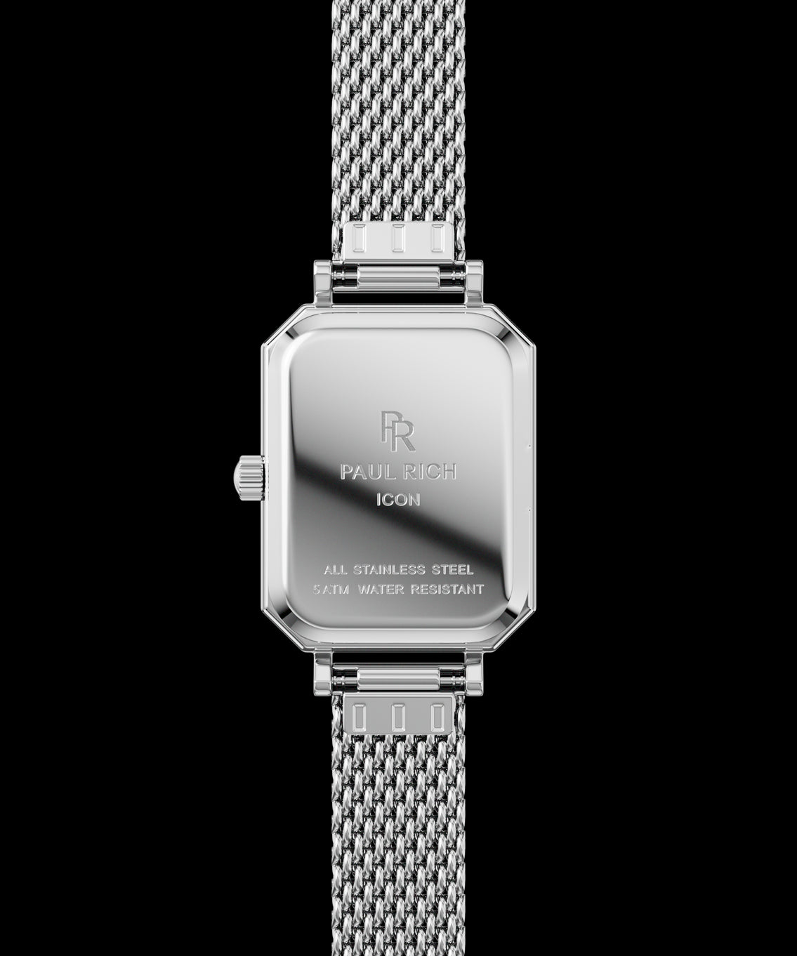 Back view of a silver-tone Paul Rich watch with rectangular case engraved with βPaul Rich ICON,β βAll Stainless Steel,β and β5ATM Water Resistant,β shown with a silver mesh strap. Back view of a silver-tone Paul Rich watch with rectangular case engraved with βPaul Rich ICON,β βAll Stainless Steel,β and β5ATM Water Resistant,β shown with a silver mesh strap.