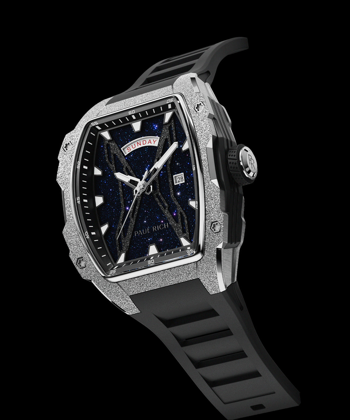 Angled view of Paul Rich watch with blue aventurine dial, silver frosted bezel, PR monogram crown, day-date display, and black strap. Angled view of Paul Rich watch with blue aventurine dial, silver frosted bezel, PR monogram crown, day-date display, and black strap.