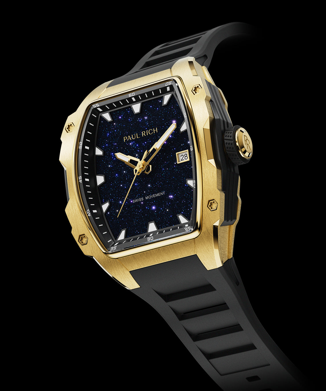 Angled view of a Paul Rich gold-tonneau watch with blue aventurine dial, gold-tone hands, date window, and black rubber strap. Angled view of a Paul Rich gold-tonneau watch with blue aventurine dial, gold-tone hands, date window, and black rubber strap.