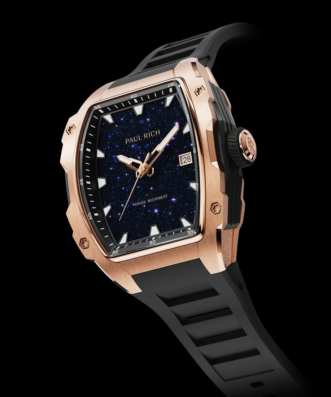 Angled view of a Paul Rich rose gold tonneau watch with blue aventurine dial, rose gold hands, date window, and black textured rubber strap. Angled view of a Paul Rich rose gold tonneau watch with blue aventurine dial, rose gold hands, date window, and black textured rubber strap.