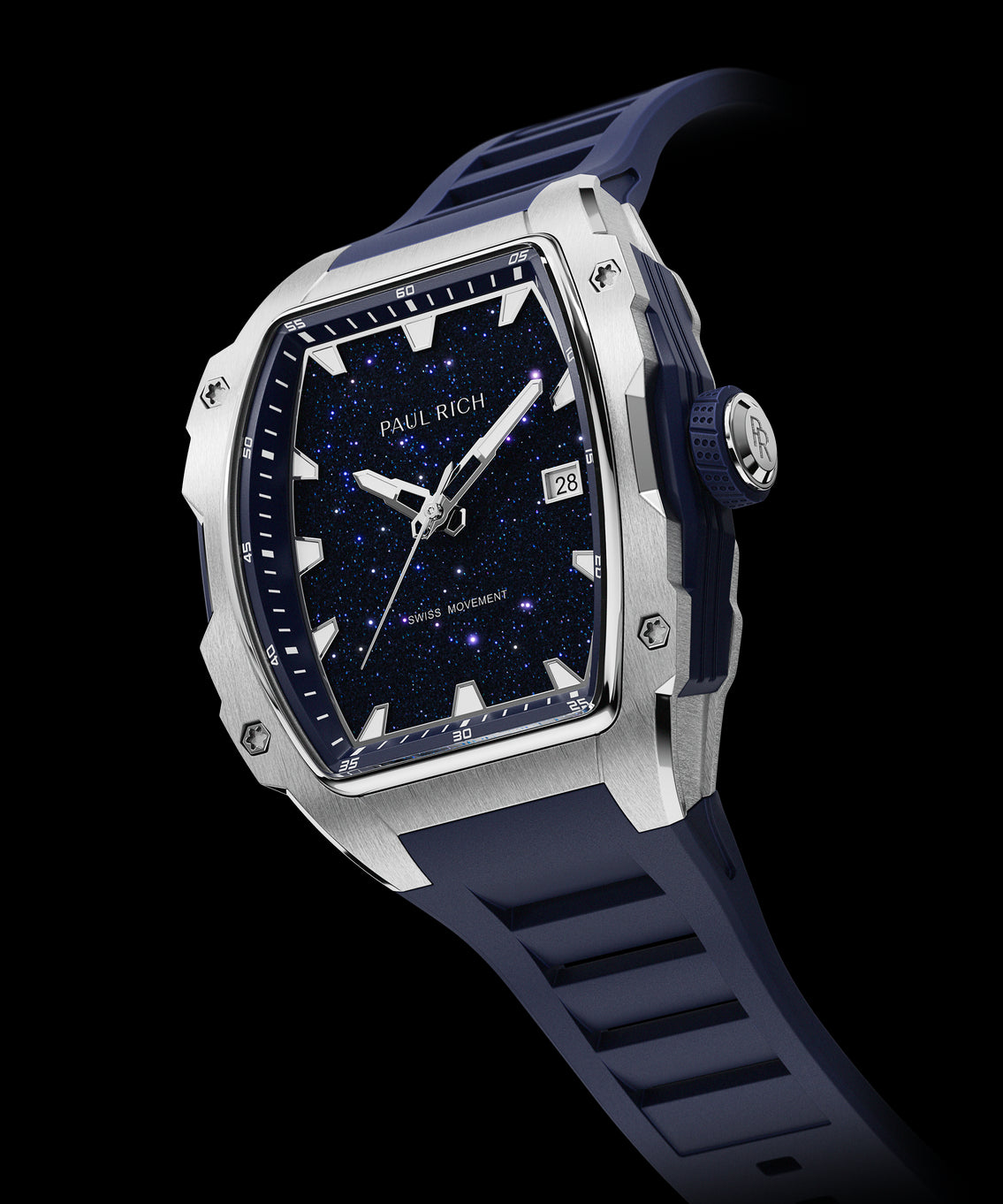 Angled view of a Paul Rich silver-tonneau watch with blue aventurine dial, silver hands, date window, and blue textured rubber strap. Angled view of a Paul Rich silver-tonneau watch with blue aventurine dial, silver hands, date window, and blue textured rubber strap.