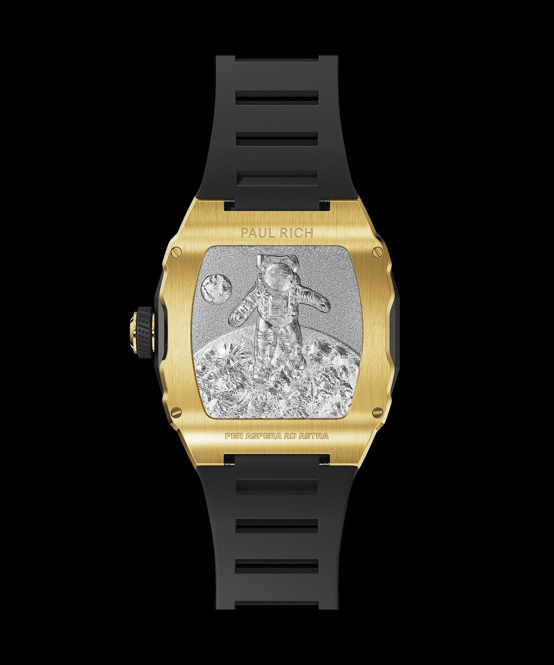 Back view of a Paul Rich gold-tonneau watch with engraved astronaut on the moon, “PER ASPERA AD ASTRA” inscription, and black rubber strap. Back view of a Paul Rich gold-tonneau watch with engraved astronaut on the moon, “PER ASPERA AD ASTRA” inscription, and black rubber strap.