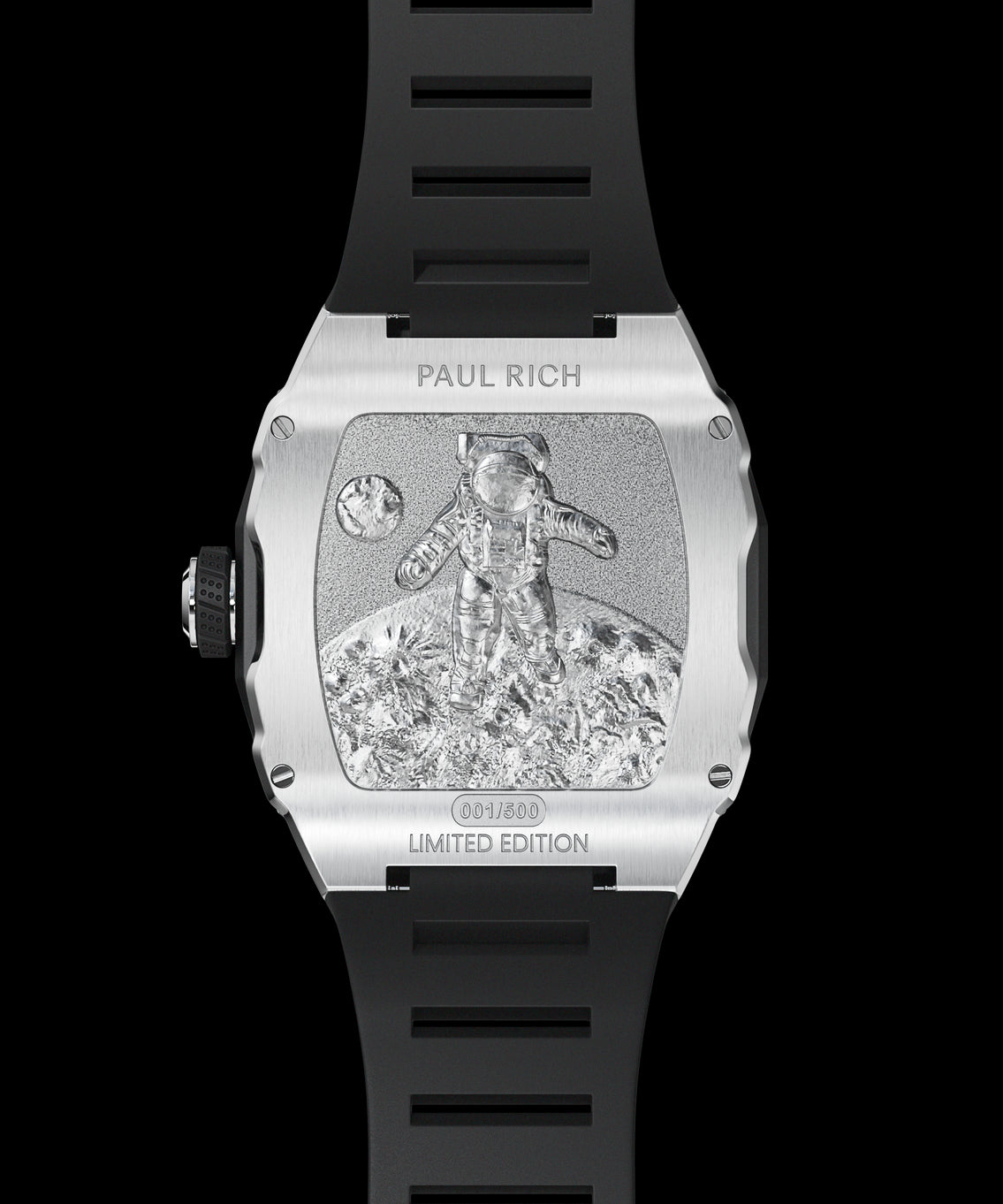 Engraved caseback of Paul Rich Astro Meteora in silver, showing astronaut on lunar surface with limited edition marking and black rubber strap. Engraved caseback of Paul Rich Astro Meteora in silver, showing astronaut on lunar surface with limited edition marking and black rubber strap.