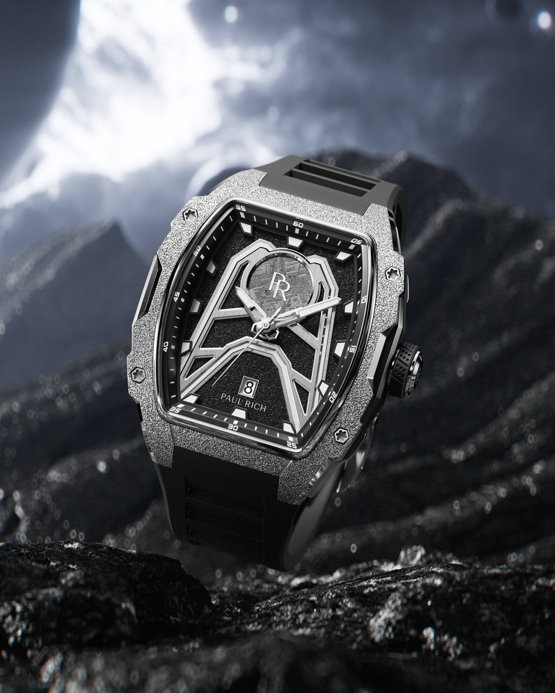Paul Rich Astro Meteora with frosted silver bezel and meteorite inlay, displayed on a rugged extraterrestrial surface with a glowing planet. Paul Rich Astro Meteora with frosted silver bezel and meteorite inlay, displayed on a rugged extraterrestrial surface with a glowing planet.