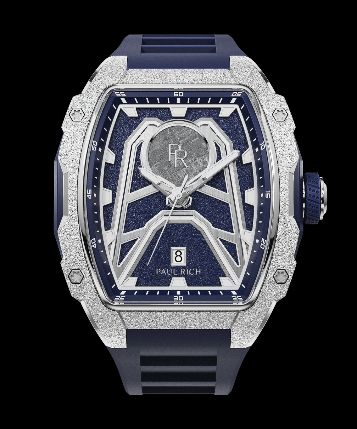 Paul Rich tonneau-shaped watch with frosted silver bezel, navy strap, aventurine dial, central meteorite inlay, and date window at 6. Paul Rich tonneau-shaped watch with frosted silver bezel, navy strap, aventurine dial, central meteorite inlay, and date window at 6.