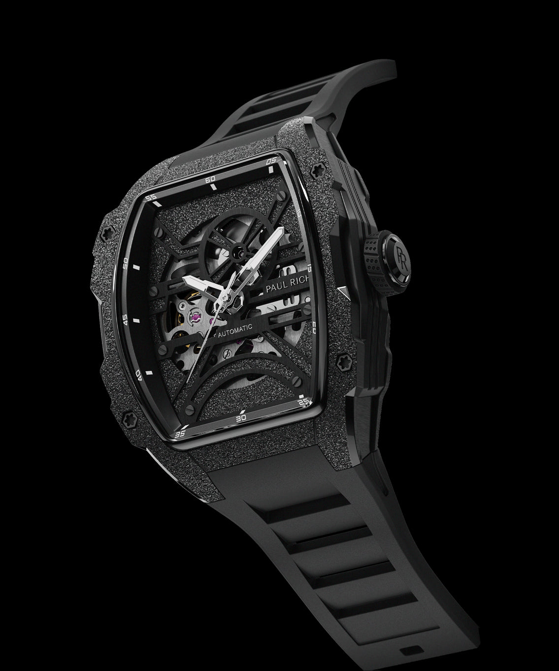 Angled view of Paul Rich watch with frosted black tonneau case, silver skeleton dial, white hands, and black rubber strap, on transparent background. Angled view of Paul Rich watch with frosted black tonneau case, silver skeleton dial, white hands, and black rubber strap, on transparent background.