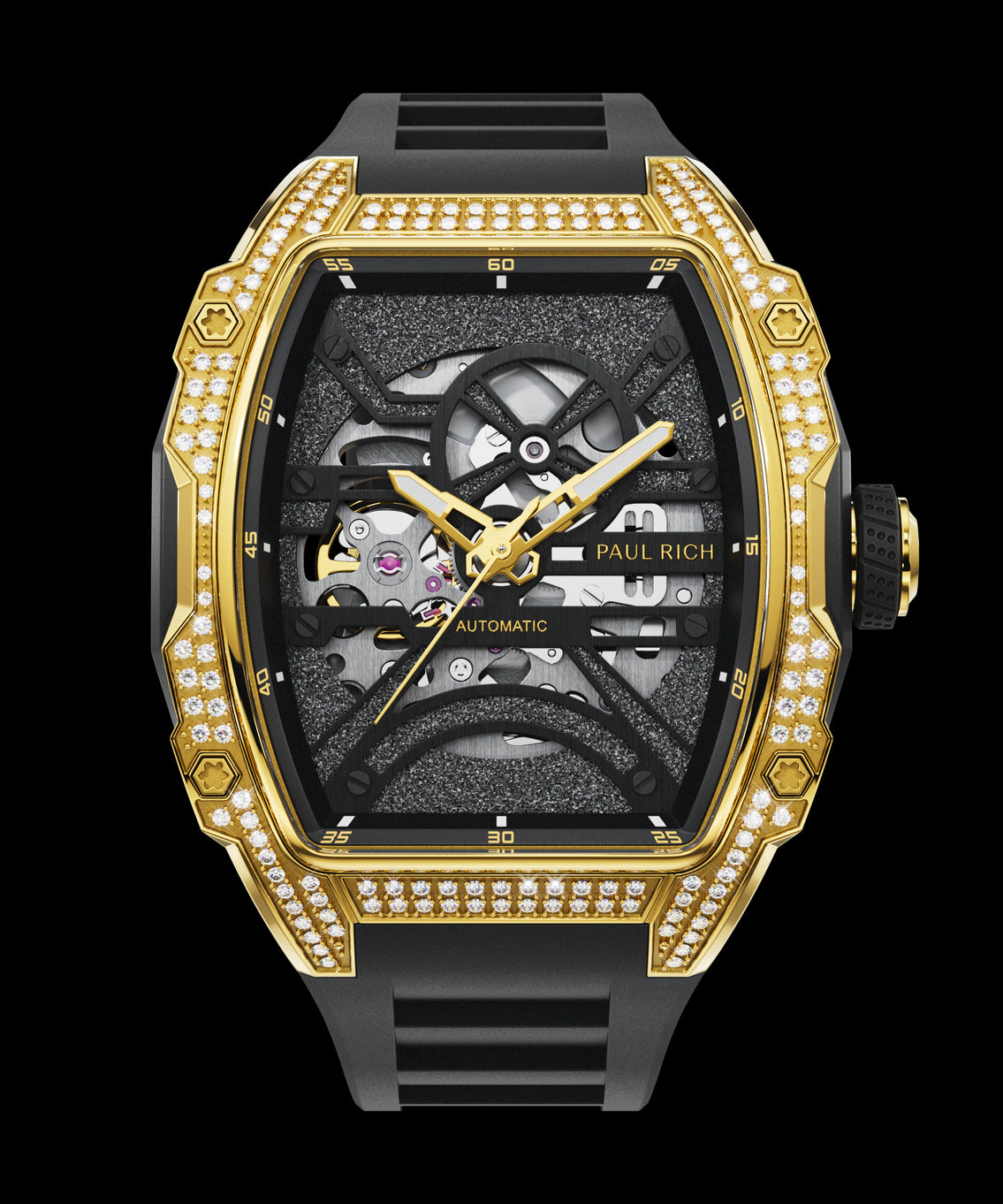 Gold tonneau-shaped wristwatch with skeleton dial, crystal-set bezel, textured metallic baseplate, and black rubber strap shown on a transparent background. Gold tonneau-shaped wristwatch with skeleton dial, crystal-set bezel, textured metallic baseplate, and black rubber strap shown on a transparent background.