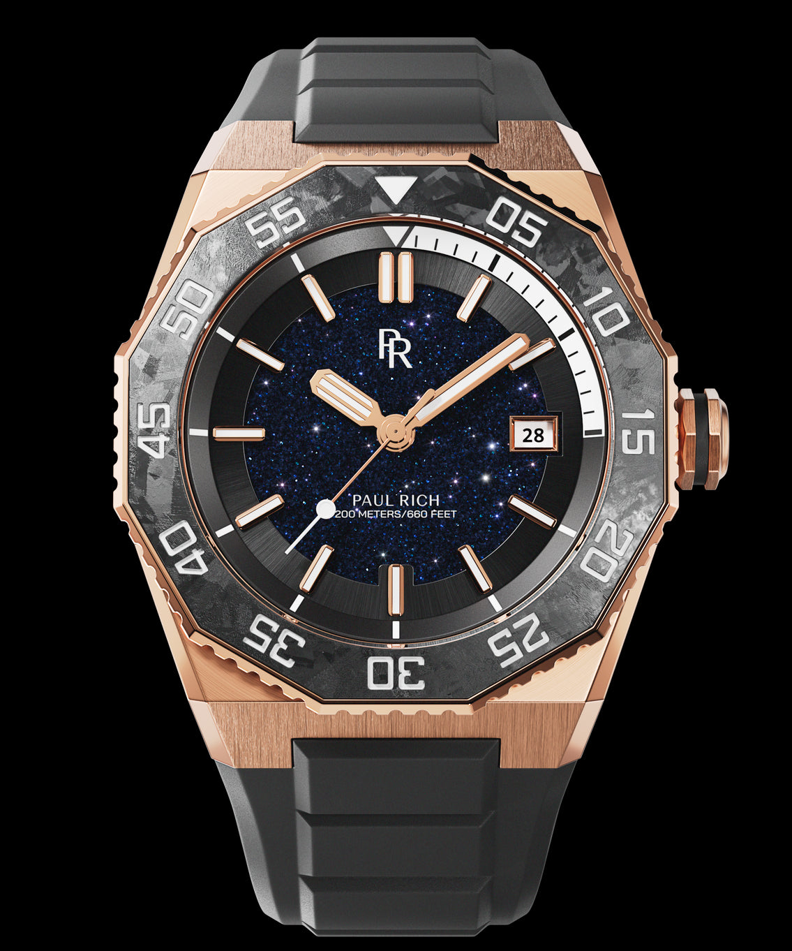 Front view of a Paul Rich watch with rose gold case, blue aventurine dial, carbon bezel with white dive time scale, and black rubber strap. Front view of a Paul Rich watch with rose gold case, blue aventurine dial, carbon bezel with white dive time scale, and black rubber strap.