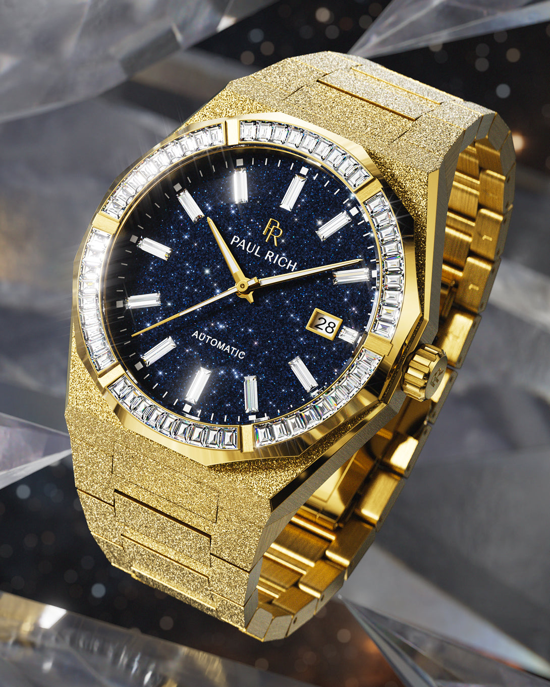 Gold automatic watch with a frosted case and bracelet, deep blue aventurine dial, and baguette-cut moissanite bezel on a crystal cosmic backdrop. Gold automatic watch with a frosted case and bracelet, deep blue aventurine dial, and baguette-cut moissanite bezel on a crystal cosmic backdrop.