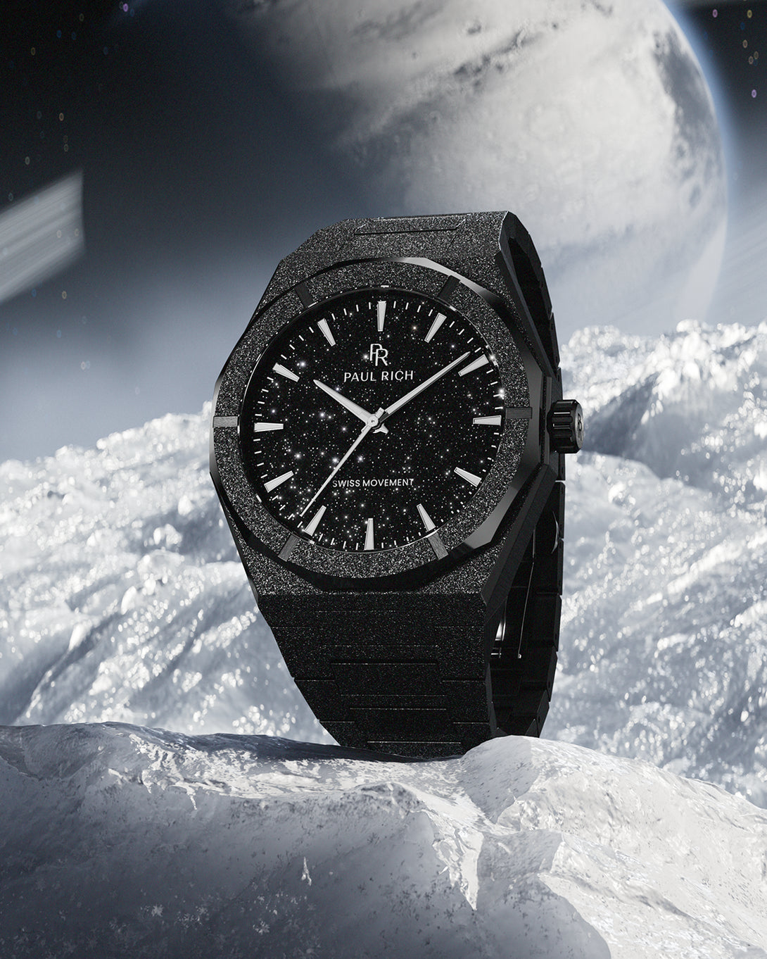 Paul Rich watch with frosted black case and black aventurine dial, displayed on a snowy surface with a moonlit space backdrop. Paul Rich watch with frosted black case and black aventurine dial, displayed on a snowy surface with a moonlit space backdrop.