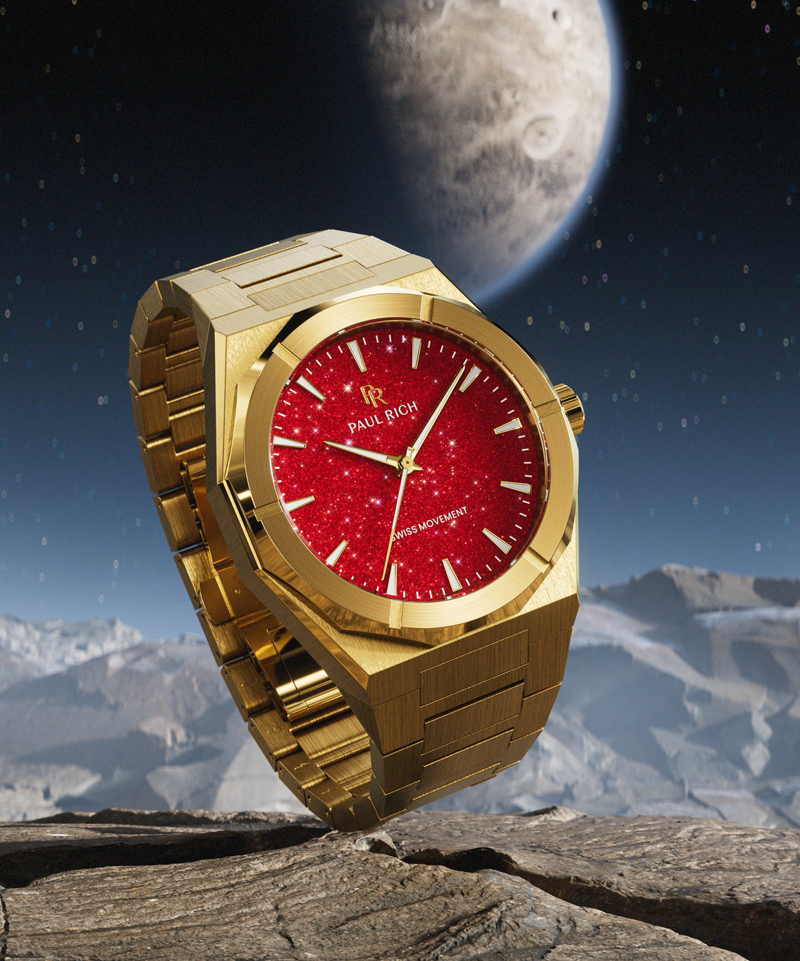 Gold Paul Rich watch with a red aventurine dial displayed on rocky terrain, with a starry sky and a planet visible in the background. Gold Paul Rich watch with a red aventurine dial displayed on rocky terrain, with a starry sky and a planet visible in the background.