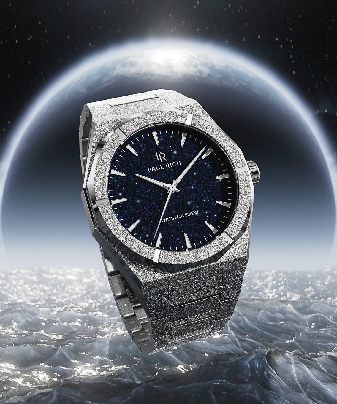 Silver frosted Paul Rich watch with blue aventurine dial floating above icy ocean, with Earth and starry space in the background. Silver frosted Paul Rich watch with blue aventurine dial floating above icy ocean, with Earth and starry space in the background.