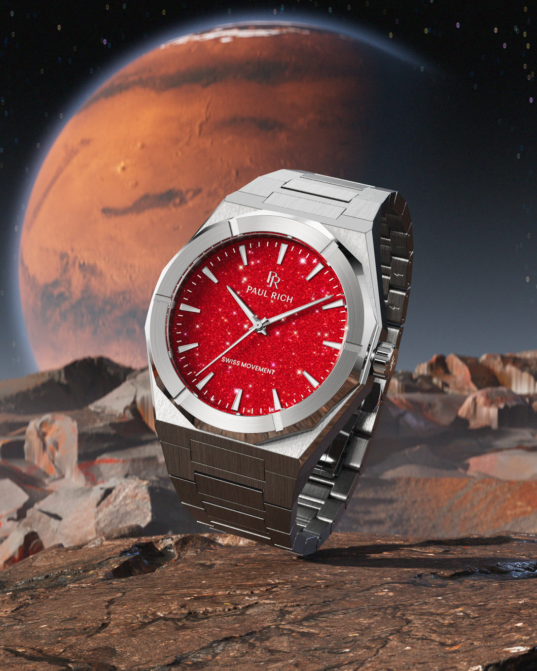 Paul Rich watch with brushed silver case and red aventurine dial, displayed on a Martian landscape with the planet Mars in the background. Paul Rich watch with brushed silver case and red aventurine dial, displayed on a Martian landscape with the planet Mars in the background.
