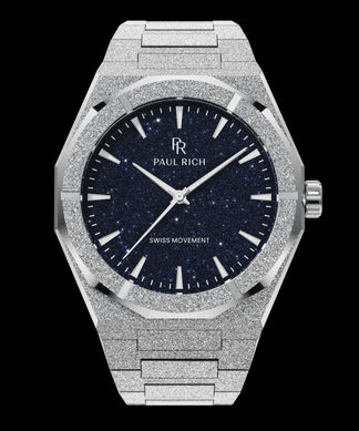 Frosted Star Dust II Silver Silver frosted Paul Rich watch with deep blue aventurine dial, silver markers and hands, and “Swiss Movement” text above 6 o’clock.