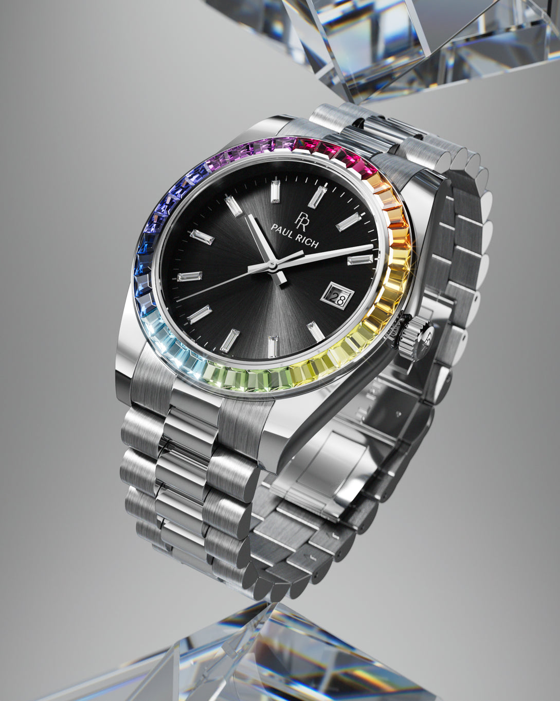 Silver wristwatch with a black sunburst dial, baguette hour markers, and rainbow bezel displayed upright on a clear crystal stand. Silver wristwatch with a black sunburst dial, baguette hour markers, and rainbow bezel displayed upright on a clear crystal stand.