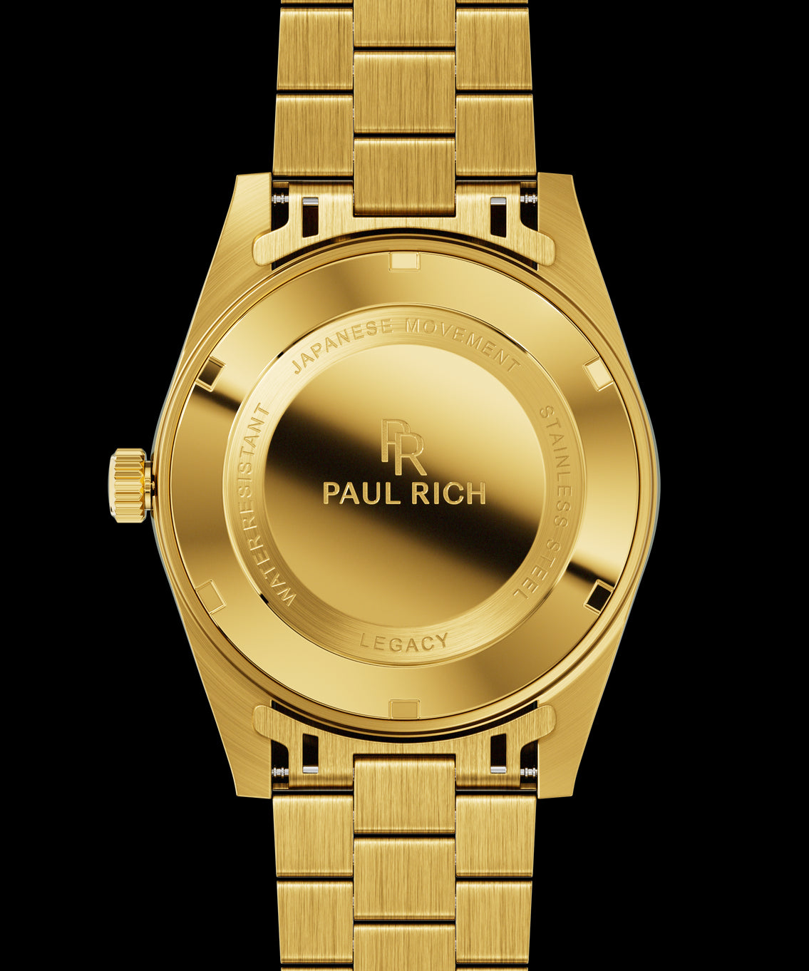 Back view of a gold-tone Paul Rich watch engraved with “Paul Rich,” “Japanese Movement,” “Stainless Steel,” “Water Resistant,” and “Legacy,” shown with a gold link bracelet. Back view of a gold-tone Paul Rich watch engraved with “Paul Rich,” “Japanese Movement,” “Stainless Steel,” “Water Resistant,” and “Legacy,” shown with a gold link bracelet.