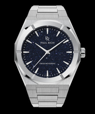 Polvo de estrellas II Plata Silver watch with brushed steel bracelet and a blue aventurine dial, featuring silver hour markers and Swiss Movement label.