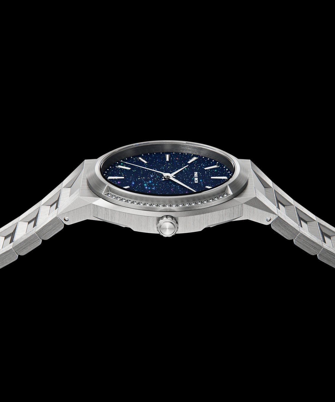 Angled side view of Paul Rich watch with round stainless steel case, gem-set bezel, blue aventurine dial, and integrated brushed steel bracelet. Angled side view of Paul Rich watch with round stainless steel case, gem-set bezel, blue aventurine dial, and integrated brushed steel bracelet.