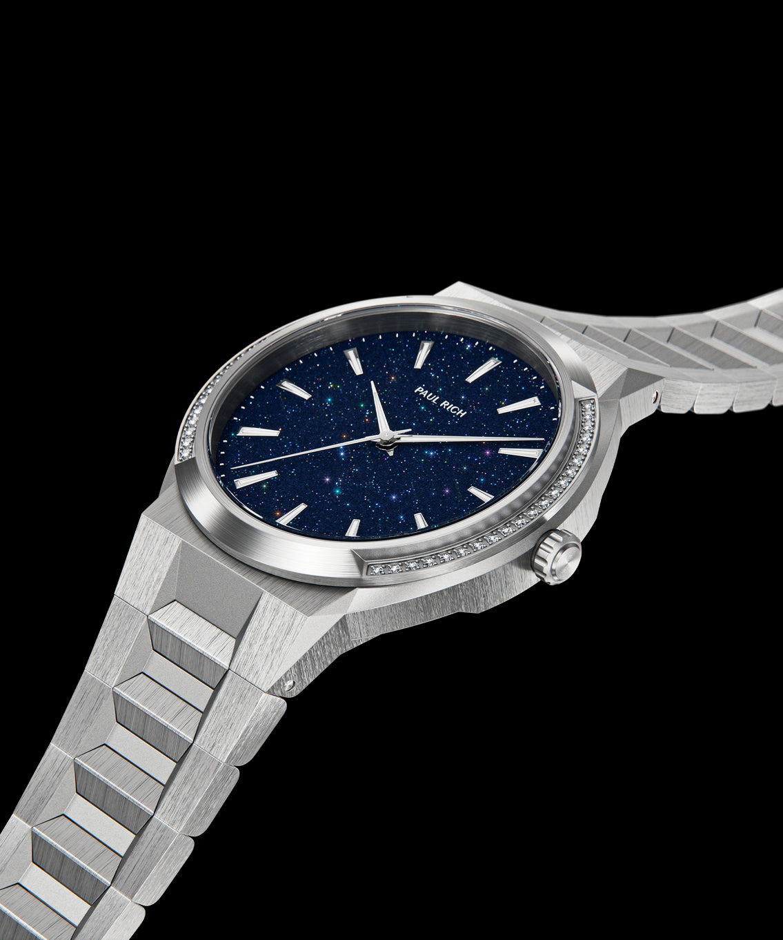 Angled front view of Paul Rich watch with round stainless steel case, gem-set bezel, blue aventurine dial, and brushed steel bracelet, shown open. Angled front view of Paul Rich watch with round stainless steel case, gem-set bezel, blue aventurine dial, and brushed steel bracelet, shown open.