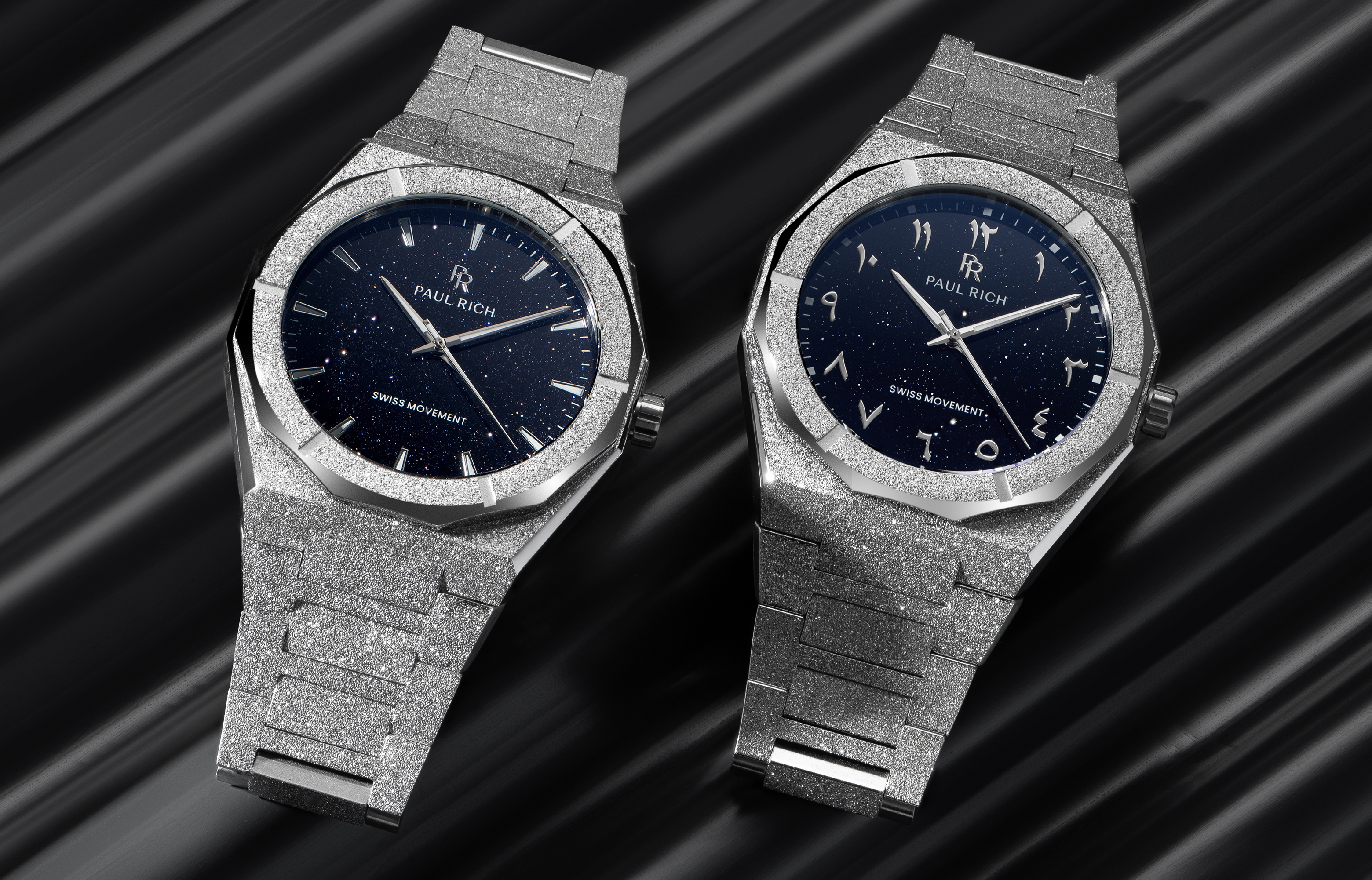 Four MoissaniFrosted Star Dust II watches in black, silver, gold, and rose gold, displayed on reflective crystal surfaces.