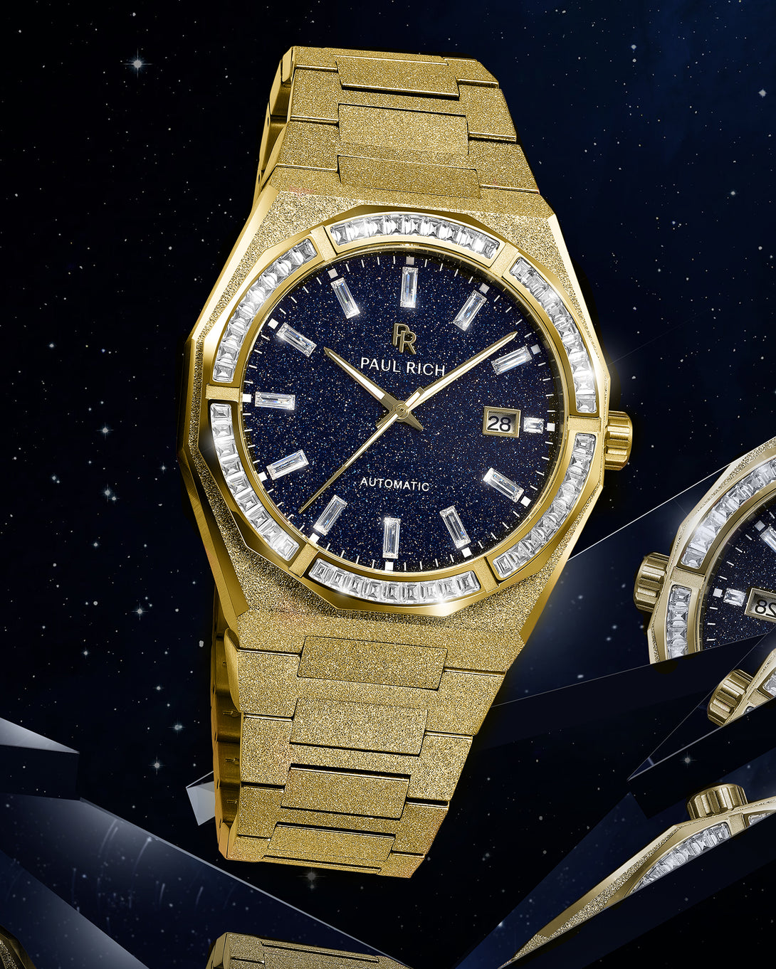 Gold frosted watch with blue aventurine dial and moissanite bezel shown against a starry background with mirrored reflections.
