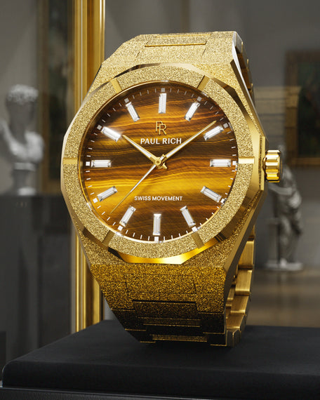 Gold Frosted Star Dust II with tiger's eye dial, glass display