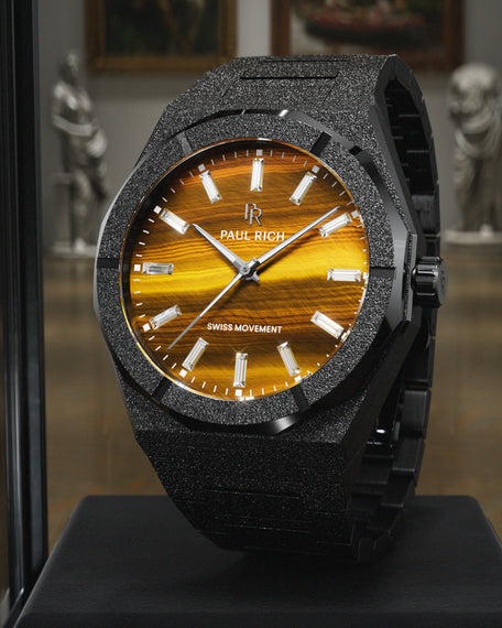Black Frosted Star Dust II with tiger's eye dial, glass display