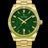 Gold watch with green aventurine dial and green gemstone-set bezel on a gold bracelet, featuring the Paul Rich logo and date window.