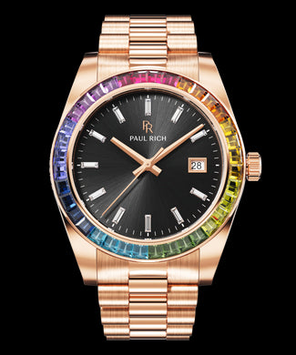 Rose gold wristwatch with a black sunburst dial, baguette hour markers, and a rainbow bezel shown on a transparent background.