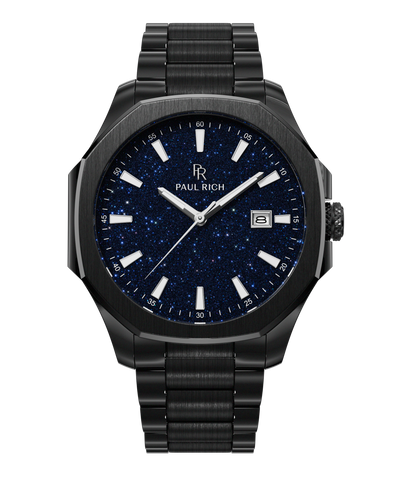 Front view of Paul Rich watch with brushed black case and bracelet, blue aventurine dial, silver indices, and date window at 3 o’clock.