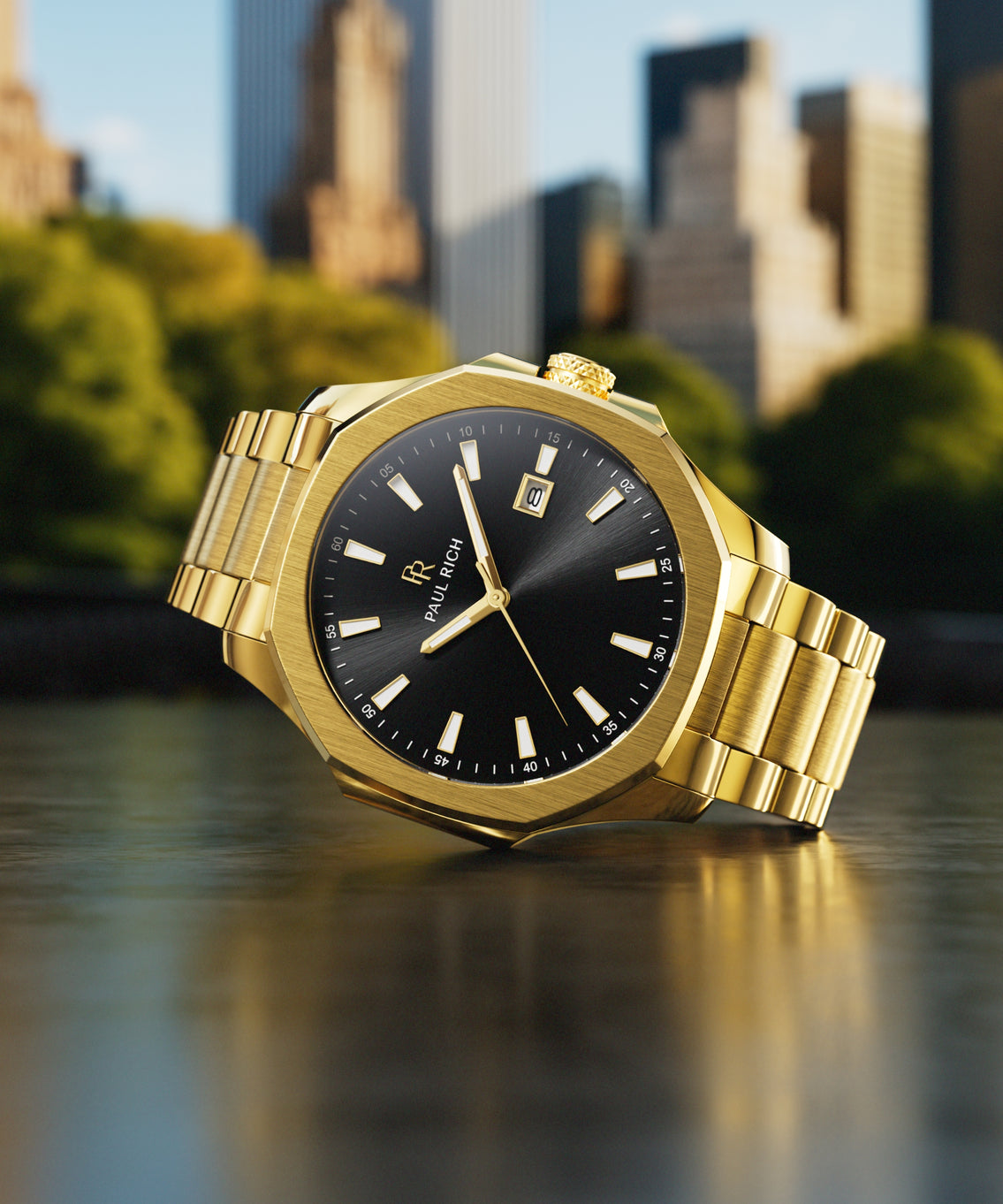 Paul Rich watch with brushed gold case and black sunray dial displayed on a reflective surface with Central Park and NYC skyline behind.