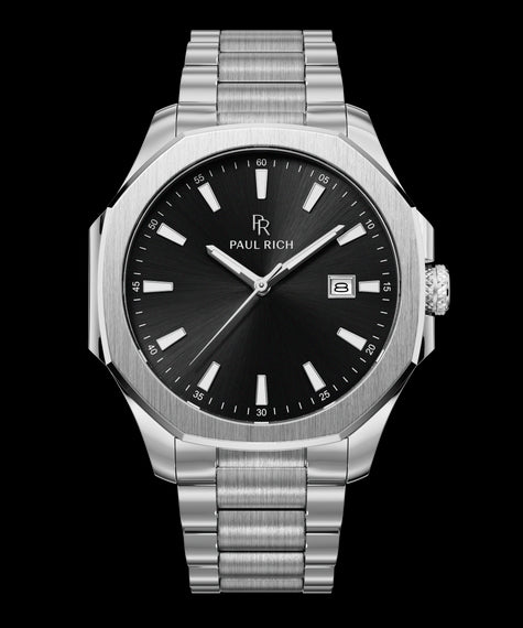 Front view of Paul Rich watch with black sunray dial, silver indices, date window at 3 o'clock, and brushed silver bracelet.