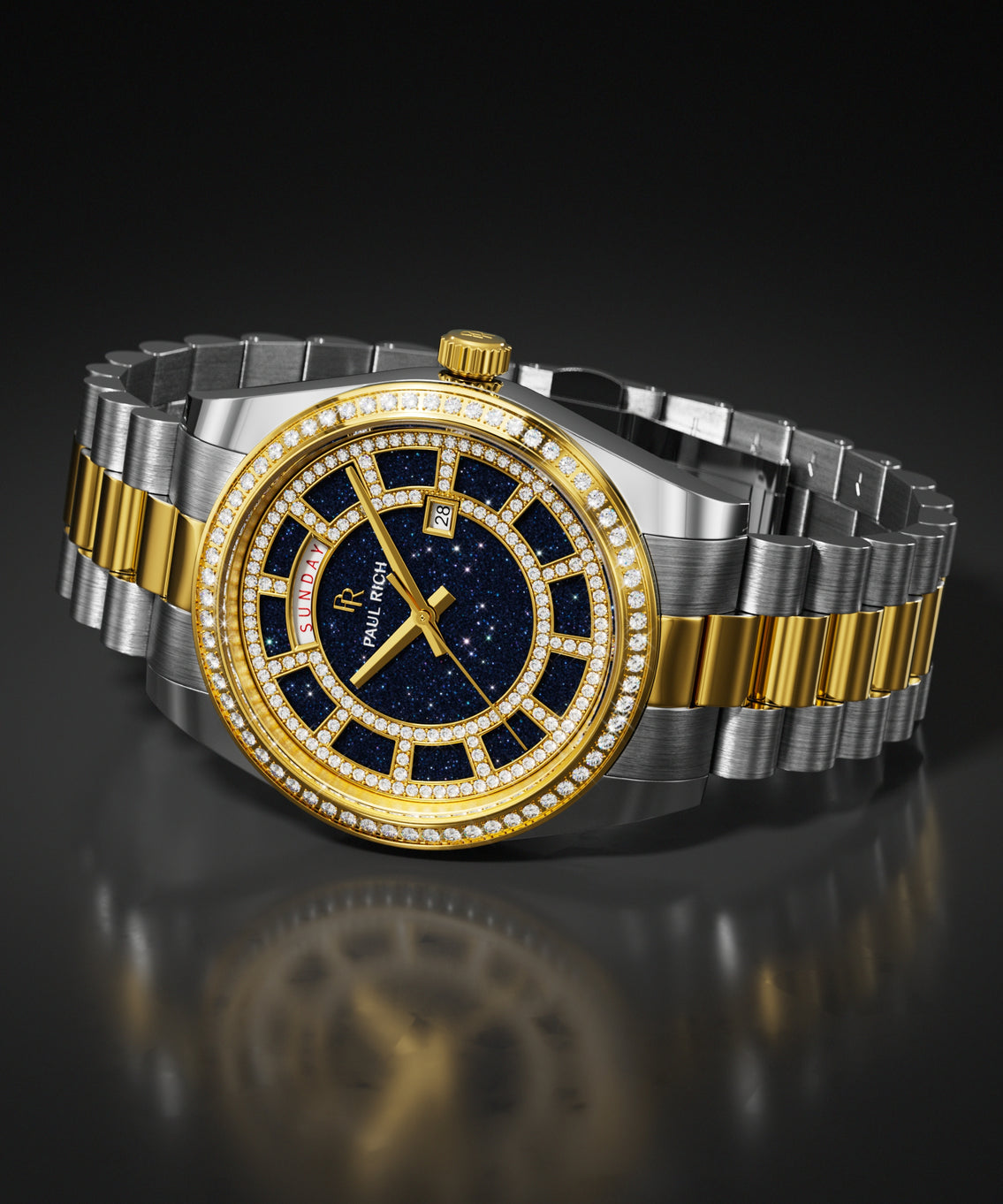 Two-tone silver and gold watch with a blue aventurine dial and a pavé stone-set bezel, shown on a steel bracelet against a dark background.