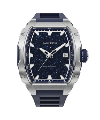 Front view of a Paul Rich silver-tonneau watch with blue aventurine dial, silver hands, date window, and blue rubber strap.