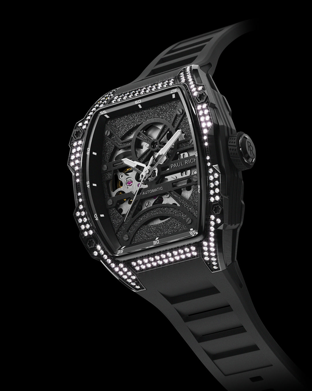 Angled view of black open dial luxury watch with silver movement, diamond-set black case, and black strap on black background.