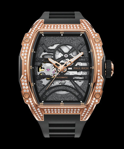 Front view of open dial watch with diamond-set rose gold case and black strap on white background.