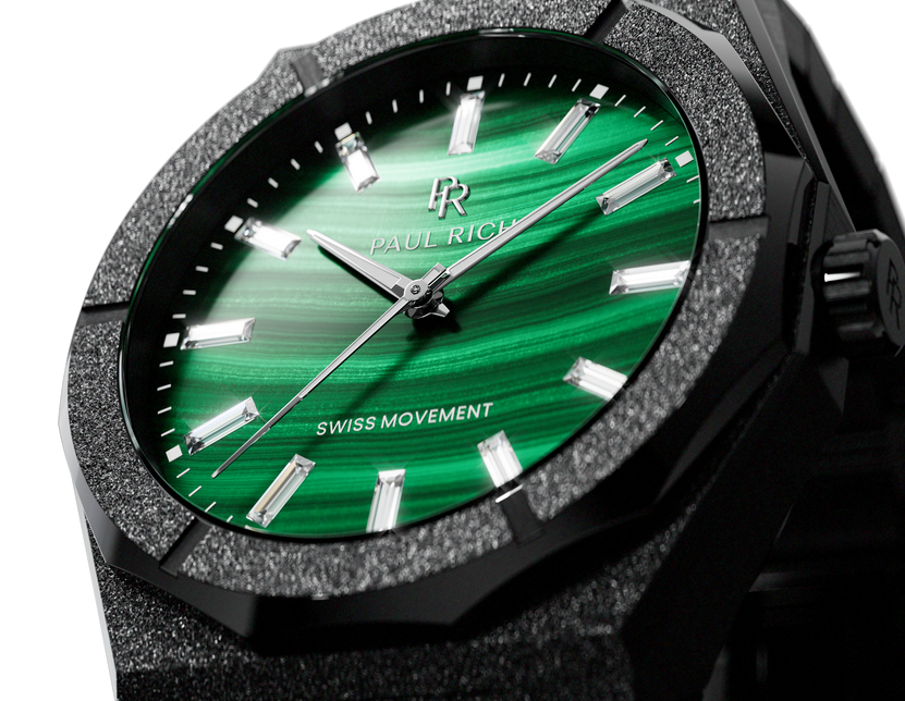 Close-up of a black Malachite Aurora watch showing its banded green dial and frosted case