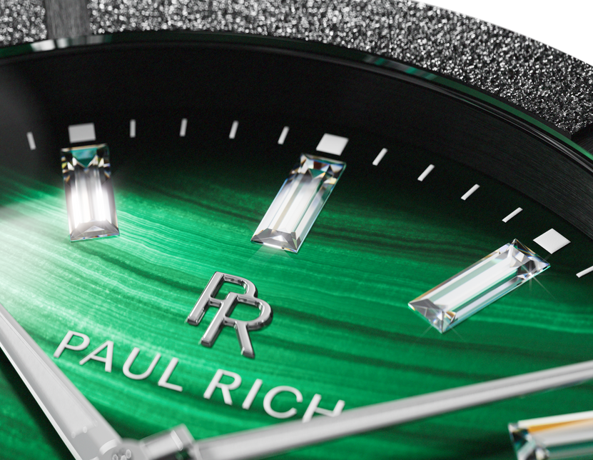 Macro of a banded green Malachite Aurora dial with baguette markers and black frosted bezel