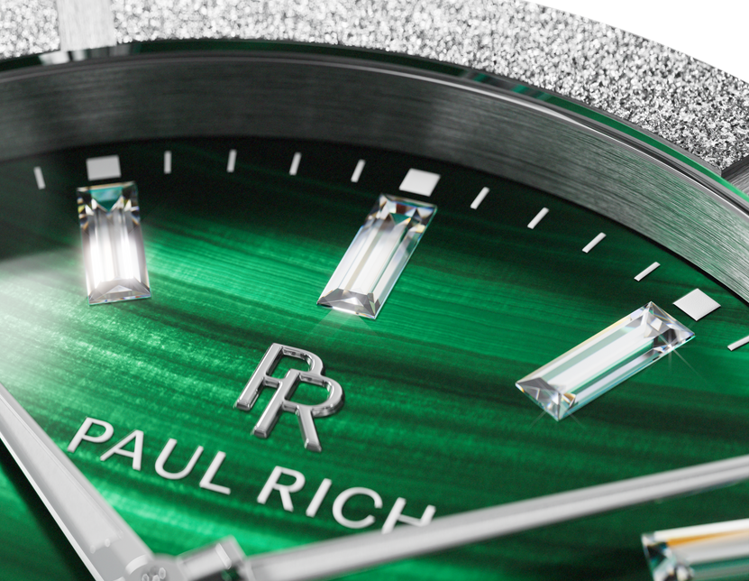 Macro of a banded green Malachite Aurora dial with baguette markers and silver frosted bezel