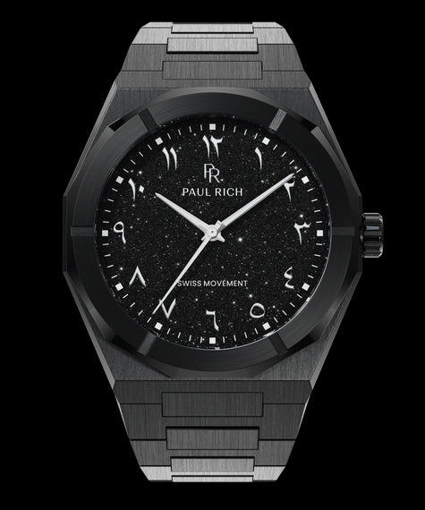 Black watch with brushed case, black aventurine dial, and Arabic numerals, displayed on a transparent background.
