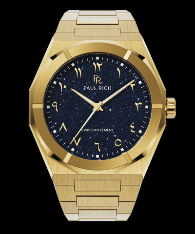 Paul Rich watch with brushed gold case and bracelet, featuring a blue aventurine dial with Arabic numerals and gold hands.