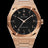 Rose gold watch with brushed finish, black aventurine dial, and Arabic numerals, displayed on transparent background.