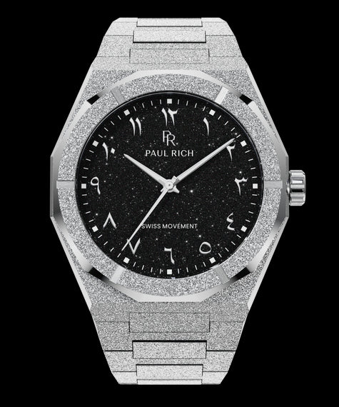 Silver watch with shimmering frosted case, black aventurine dial, and Arabic numerals, displayed on transparent background.