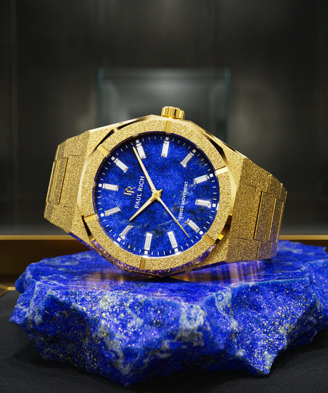 Gold Frosted Star Dust II with lapis lazuli dial, glass display